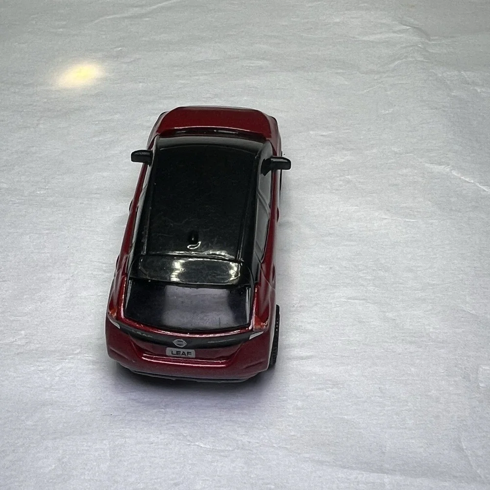 MATCHBOX 2022 MBX ELECTRIC DRIVERS EXCLUSIVE 2018 NISSAN LEAF METALLIC RED Loose